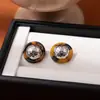 Aretes clásicos con estampado de leopardo estilo Maillard con cuentas redondas irregulares y tachuelas plateadas, nuevos aretes europeos y americanos incrustados con piedra de ojo de tigre para mujer