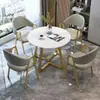 Mesa de comedor de placa de roca de lujo ligero mesa redonda pequeña nórdica mesa simple de oficina de ventas mesa de negociación mesa para apartamento pequeño en casa mesa redonda de ocio