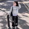 Elegante y Versátil Moda para Niñas Moderna Combinación Perfecta Rayas Patchwork Cuello Polo Falso Dos Piezas Sudadera Pantalones Anchos Casuales Conjunto