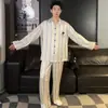 Pijama de seda helada de otoño para hombre, conjunto fino de seda de manga larga y pantalón largo, ropa de casa de alta gama, se puede usar en el exterior, conjunto de dos piezas para hombre