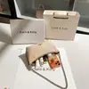 Dropshipping Nicho Lujo Vintage Monograma Bolso de Media Luna 2026 Verano Nuevo Estilo Bolso de Hombro con Cadena de Gama Alta Venta al por Mayor
