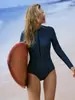 Traje de baño de una pieza de comercio exterior transfronterizo para mujer, con lunares, manga larga, protección solar, traje de surf y buceo, deportivo, protección solar profesional, traje de baño europeo y americano