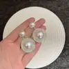 Pendientes de botón geométricos redondos de perla ultra brillantes de estilo francés, Pendientes exagerados de lujo ligero de moda para el día a día