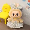 A primeira e segunda geração de caixas surpresa com roupas de boneca Labubu pelúcia rosto de vinil boneca pingente puxar pano sentar série festa