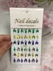 Pegatina de uñas estilo japonés nueva de fábrica, cinta de ballet, estrella, luna, mariposa de ensueño, llama, decoración de pegatina de uñas en blanco y negro