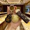 Llavero Amarillo Dorado Dios de la Riqueza Oro Puro 999 Cadena para Teléfono Móvil de la Fortuna Souvenir para Eventos de Negocios Aniversario Al por Mayor