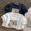 2026 Nova Moda Estilo Coreano Gola Redonda Estampa de Letras Desenho Animado Manga Curta Camiseta Feminina Solta Emagrecedora Versátil Top