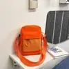Bolsa Quadrada Pequena Casual Estilo Novo 2026 para Homens e Mulheres, Bolsa Transversal Esportiva Moderna e Descolada, Bolsa de Nylon Leve para Celular para Estudantes