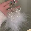 Pendientes Largos de Plumas Lujosos y Dulces con un Diseño de Felpa de Hada Moderno y Exagerado