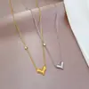 [Aço titânio corpo inteiro] Colar de ouro maciço estilo minimalista com zircônia em formato de coração de pêssego para mulheres, corrente para clavícula de celebridade da internet