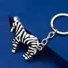 Llavero de Cebra con Gota de Aceite de Colores Lindo Animalito Colgante de Coche Cebra Pequeña Regalo Pequeño de Zoológico Venta al por Mayor