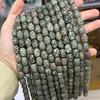 Ágata natural cuentas de barril de tres ojos cuentas sueltas estilo Tíbet Tianzhu al por mayor cuentas de tambor de material antiguo cuentas de tótem antiguas Lezi Wenwan