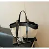 Bolso de lona de nicho con gran capacidad, bolso tote de moda 2026, nuevo modelo para commuting, bolso de hombro único para mujer en negro y caqui