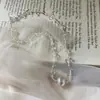 Moderna, genial, cuenta transparente, cuenta redonda cepillada, collar, lujo ligero, sensación de alta gama, moderna, diseño de nicho, cadena para la clavícula, estilo nuevo