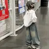Jeans para Niños Primavera y Otoño 2026 Nuevo Estilo Otoño Moda Salpicaduras de Tinta Denim Pierna Ancha Pantalones Largos Niños Medianos y Grandes Transfronterizos Modernos