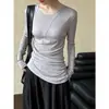 Camiseta blanca de cuello redondo y manga larga irregular estilo francés para mujer, diseño de otoño, corte ajustado, top base que ciñe la cintura
