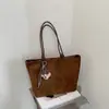 Bolso de mano grande de estilo coreano, minimalista y elegante, bolso cruzado con acabado mate, bolso de cadena minimalista de nicho, bolso de hombro tipo cubo para mujer