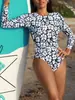 Bikini de una pieza 2024 Floral Escote pronunciado Sexy Estilo transfronterizo europeo y americano Cubre abdomen Espalda descubierta Conservador Manga larga Traje de buceo
