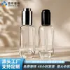 En stock botella de aceite esencial de 30 ml, transparente redonda de pared gruesa con gotero de presión, botella dispensadora de vidrio, sellada y portátil para cuidado de la piel