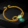 Venta al por mayor de fábrica Lanza telescópica manual Nezha con punta de fuego, Bastón dorado de Sun Wukong, Juguetes para niños, Artículos para vendedores ambulantes y lugares turísticos.