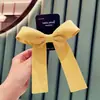 Tienda de Fábrica Corea del Sur Dongdaemun Nuevo Listón de Terciopelo Pinza Lateral para el Cabello con Lazo Grande Estilo Madre Bebé Padres e Hijos
