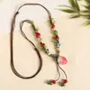 Collar con colgante de campana de mariposa de cerámica de estilo étnico retro para mujer, diseño nuevo y moderno, cadena larga para suéter, accesorios