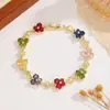 Nuevo brazalete de circonita de mariposa de colores, diseño de nicho estilo ins, brazalete de flor chapado en oro, favorecedor y versátil