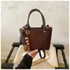 Bolso de mano de moda de comercio exterior para mujer, nuevo diseño de nicho, bolso cubo para el día a día, bolso de hombro y bandolera versátil vintage