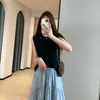 Elegante chaleco de punto sin mangas en capas de Tencel-lino con abertura trasera y botones de concha para mujer, nuevo modelo 2026