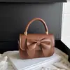 Moda Literaria de Comercio Exterior Lazo Sencillo Bolso de Mujer 2026 Versión Coreana Nueva Llegada Texturizado Cruzado Hombro de Mano Pequeño Cuadrado