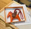 H casa costurado à mão alta qualidade pele de ovelha Anjo Pégaso bolsa pingente fofo feminino bolsa de mão ornamentos chaveiro de carro