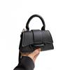 Bolso pequeño texturizado portátil, bolso de mano de alta gama para mujer 2024 nuevo mini moda versátil hombro cruzado pequeño bolso cuadrado