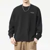 Camiseta negra de manga larga de alta gama, discreta y elegante para hombre, perfecta para primavera y otoño, con corte holgado, cuello redondo y diseño casual, adecuada como capa base o sudadera.