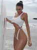 Traje de baño europeo y americano de una pieza, diseño sexy hueco para mujer, corte alto, adelgazante, adecuado para vacaciones en la playa, traje de baño transfronterizo para mujer de Amazon