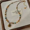 Collar Colgante Gota de Agua Piedra Ojo de Tigre Maillard Estilo Hong Kong Moda Versátil Cadena para Suéter Joyería de Nicho Venta al por Mayor