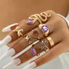 Joyería de Lujo Ligero Transfronteriza Europea y Americana Anillo de Amor de Diamante Púrpura de Ocho Piezas Anillo Multipieza con Forma de Corazón de Durazno y Serpiente