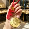 Presente para o Festival do Meio Outono: Moeda de ouro puro 999 "Riqueza Dia a Dia" chaveiro de bolo da lua pingente para pulseira de celular com embalagem de caixa de presente