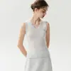 Novo colete de malha outono/inverno, gola V, cor sólida, sem mangas, com acabamento ondulado, versátil, slim fit e que valoriza a silhueta, em estilo francês, perfeito para o trabalho.