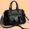 Bolsas de Mujer Transfronterizas 2026 Modelos Nuevos de Moda Bolsos de Hombro Cruzados Prácticos Bolsos de Mano Sencillos para Mujeres de Mediana Edad y Madres