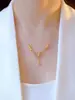 Nuevo Collar de Mariposa Dorado Hueco con Borlas Estilo Coreano Collar para Clavícula de Mujer Cuentas de Transferencia de Tendencia Simples Tendencia