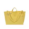 Bolsa de lona con estampado de letras para mujer, nuevo modelo 2026, gran capacidad, bolso de hombro simple y artístico, bolsa para el trabajo