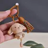 Llavero colgante de gato lindo tallado en madera maciza, decoración para bolso, adorno de gato de madera creativo con cola que se mueve
