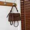Otoño 2026 Nuevo Elegante Bolso Cruzado Texturizado Retro Cuadrado Pequeño Simple Versátil Bolso de Hombro Femenino Moda al Por Mayor Bolsos para Mujer