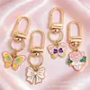 Colgantes de dibujos animados rosas lindos estilo coreano, dijes de aleación de esmalte de conejo y estrella, llaveros con anilla en D, accesorios para manualidades, venta al por mayor