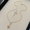 Nuevo Collar de Moda de Lujo Ligero con Estrella de Cuatro Puntas para Mujer, Cadena para Clavícula Dulce y Linda de Acero de Titanio, Collar de Zirconia de Temperamento de Alta Gama