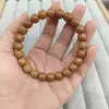 Pulseira Premium Vintage Cabeça de Macaco Semente de Pêssego com Pena de Fênix Base de Abóbora Cabeça de Macaco para Homens e Mulheres, Cordão de Contas Brinquedo Cultural de Círculo Único Fabricante Atacado