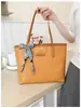 Bolsa de Hombro para Mujer Retro Tejida 2026 Nueva Gran Capacidad Bolso de Mano para el Trabajo Textura de Cuero PU Bolso de Moda para Mujer Venta al por Mayor