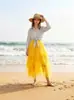 Saia de tule feminina com design de cintura alta, feita de tule multicamadas, comprimento médio, estilo rock