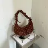 Bolso de media luna de diseño nicho, casual y moderno, para mujer, nuevo bolso tipo bollo 2026, bolso de hombro para llevar debajo del brazo para la ciudad, bolso de moda