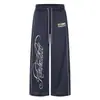 Pantalones deportivos de malla transpirable para hombre, marca trendy vibe con estampado de letras florales, cintura elástica, pantalones casuales rectos holgados